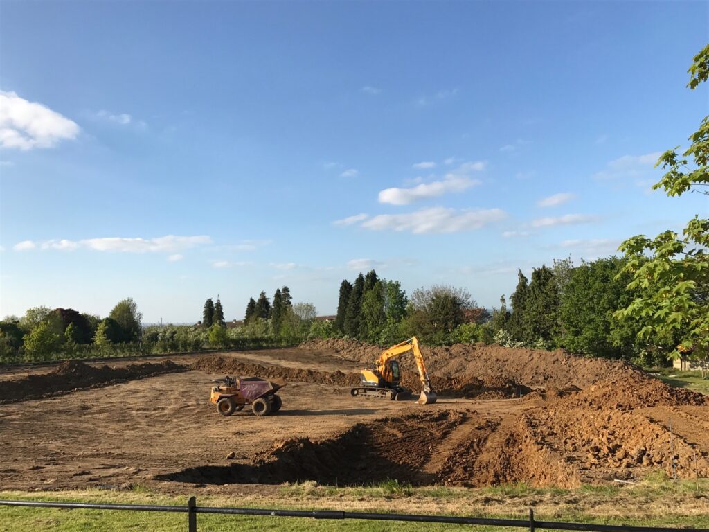 excavator and dumper working on site