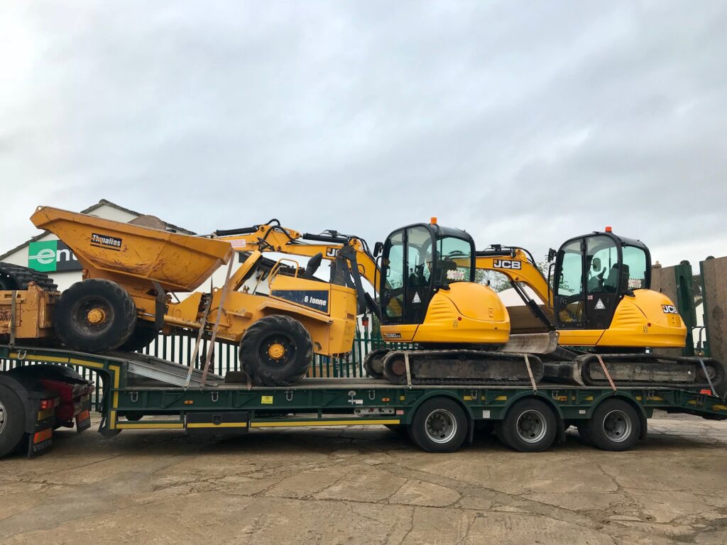 jcb excavators and thwaites dumper arriving at jay bee plant sales