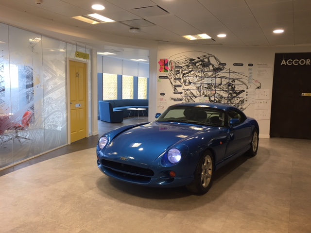 blue car at auto trader plant