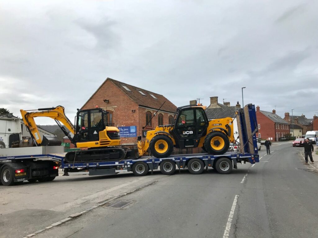 jcb excavator and jcb telehandler leaving jay bee plant sales