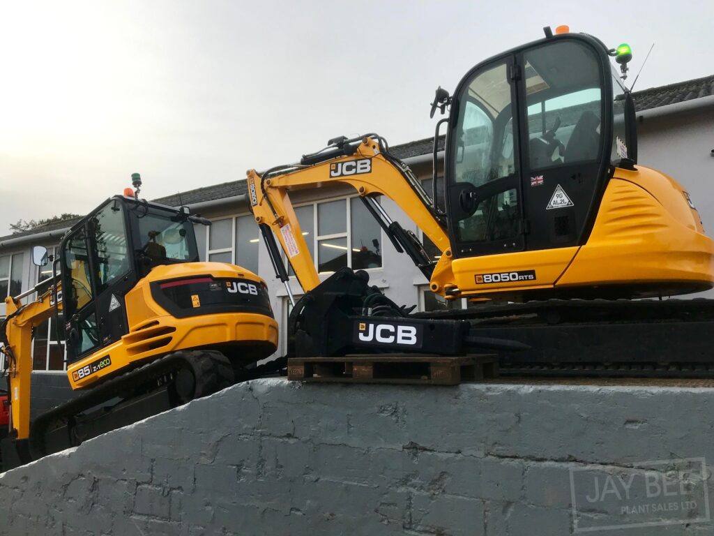 jcb excavators ready for loading at jay bee plant sales